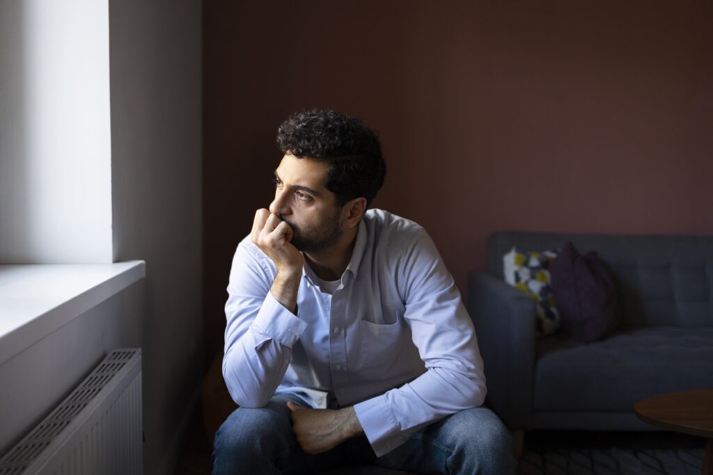 Conquer Impostor Syndrome and Thrive in Your Career: Expert Tips 5 anxious man indoors front view 1 Conquer Impostor Syndrome and Thrive in Your Career: Expert Tips
