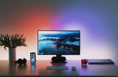 5 Essential Tips to improve your Work setup 9 Are you looking to elevate your desk or gaming setup? A well-organized and aesthetically pleasing workspace can significantly impact your productivity and overall well-being. a computer on a desk